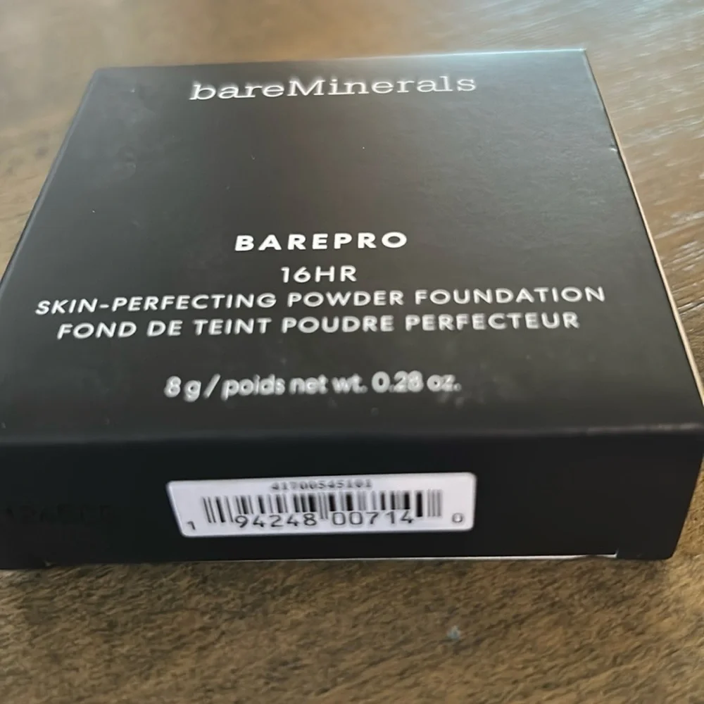 - bareMinerals BAREPRO Powder Foundation in shade:Medium Deep 40 WARM